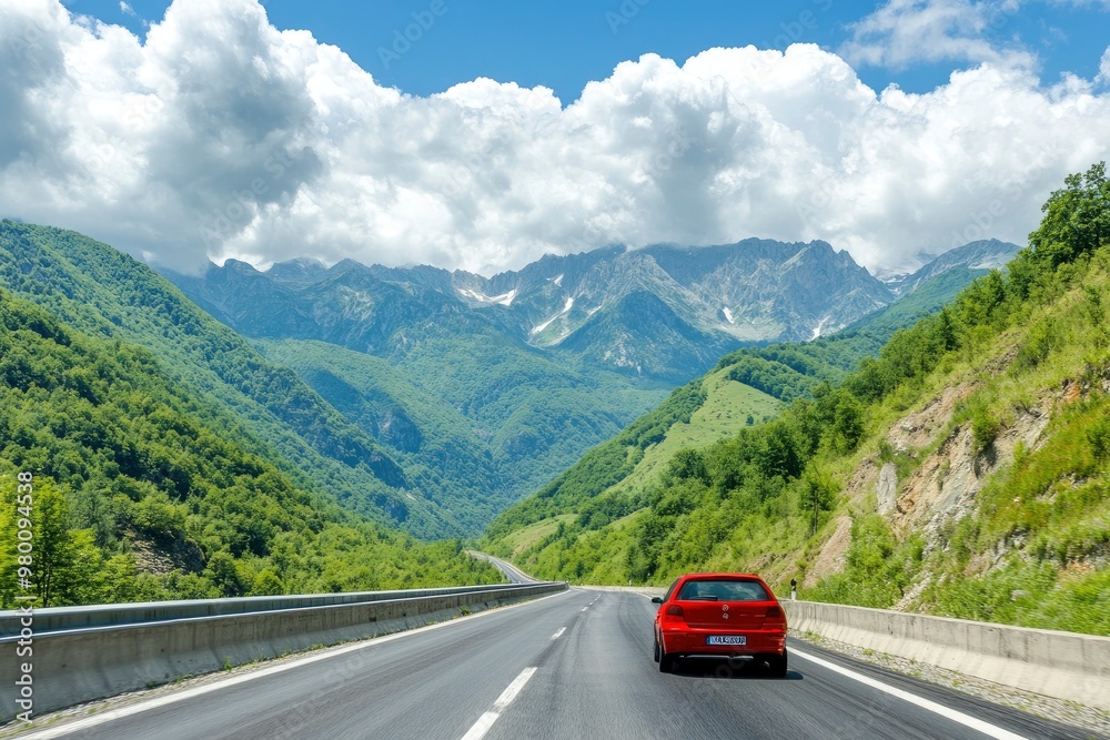 Red car driving on nature road between green mountains in summer. Nature landscape on highway for summer vacation travel. Mountain road view on beautiful nature trip in Europe. car drive highway, ai Red car driving on nature road between green mountains in summer. Nature landscape on highway for summer vacation travel. Mountain road view on beautiful nature trip in Europe. car drive highway, ai
