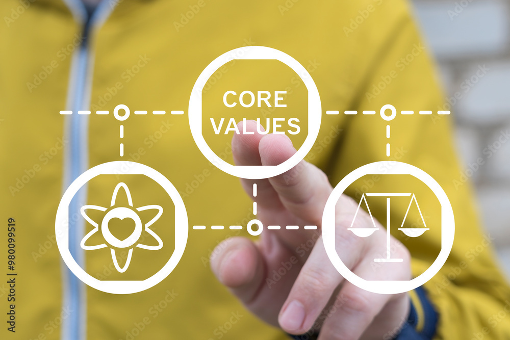 Man working on virtual touch screen presses inscription: CORE VALUES. Core values business analytics concept. Our core value.