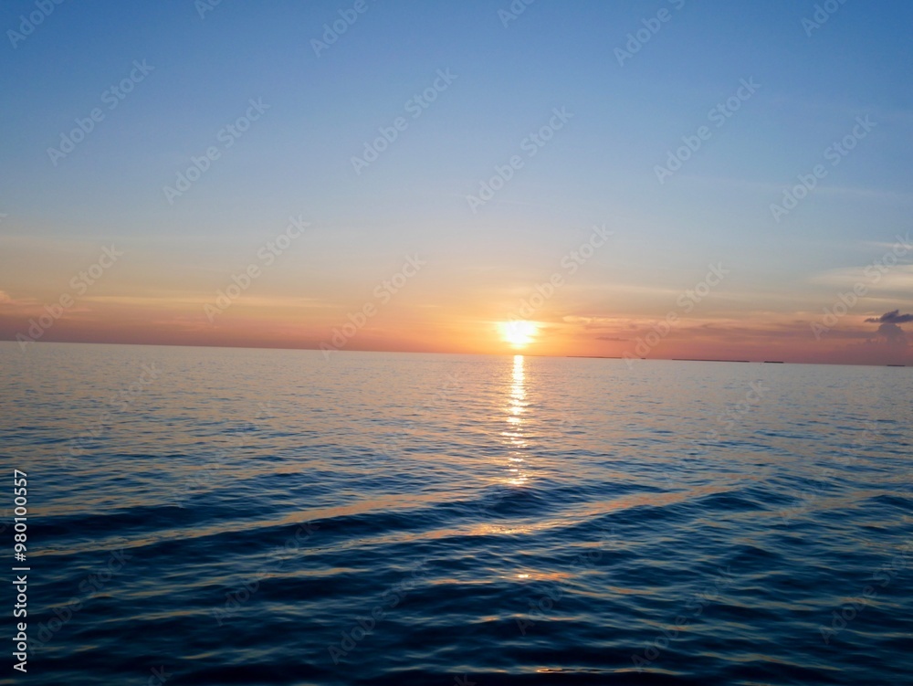 Obraz premium sunset in the sea