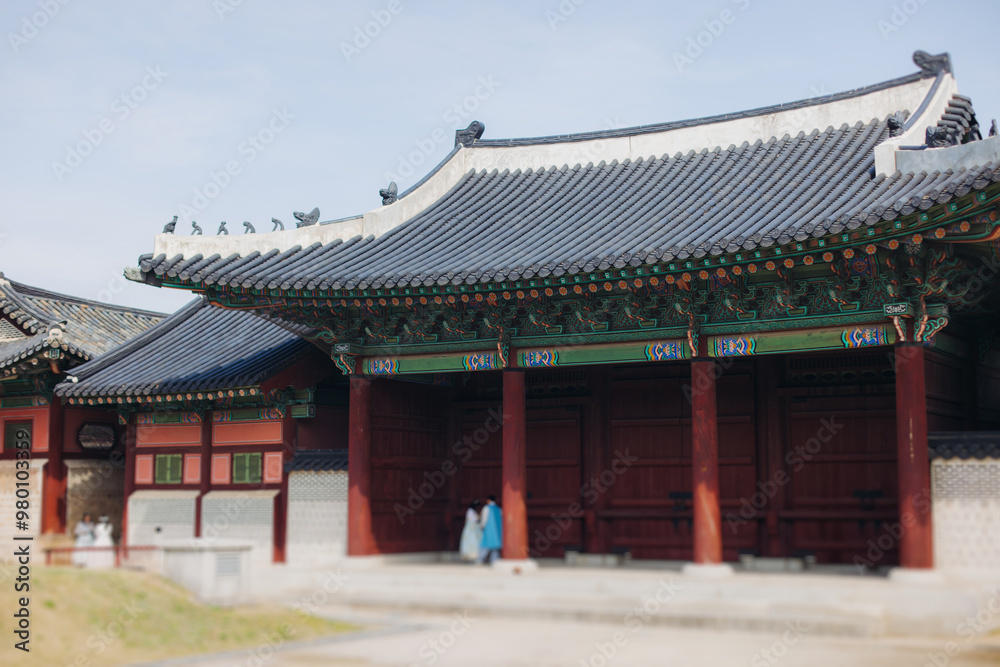 Gyeongbokgung Palace, Seoul, Jongno District, South Korea, in a spring sunny day, exterior view of main Korean royal palace in Cherry Blossom season, with Bugaksan mountain in the background Gyeongbokgung Palace, Seoul, Jongno District, South Korea, in a spring sunny day, exterior view of main Korean royal palace in Cherry Blossom season, with Bugaksan mountain in the background