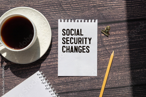 reflective surface are wooden blocks with the inscription - Social security changes