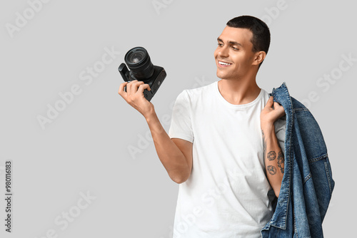 Male photographer with mode...