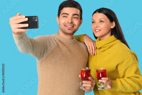 Young couple with glasses o...