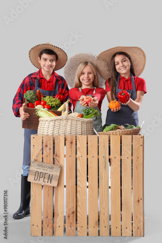 Little farmers with fresh f...