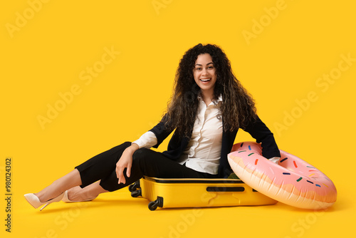 Smiling young businesswoman...