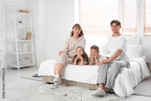 Happy parents with their li...