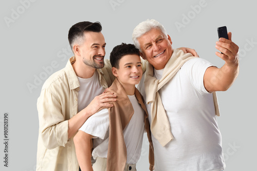 Teenage boy with his dad an...