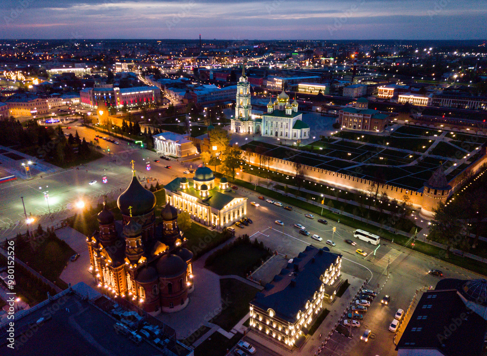 Fototapeta premium Night aerial view of Tula cityscape overlooking medieval Kremlin and Holy Assumption Cathedral, Russia