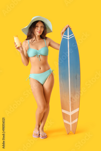 Young Asian woman in swimsu...