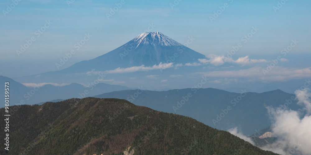 TOKYO - MAY 2017: Aerial view of Mount Fuji from Kanagawa prefecture June 2017. TOKYO - MAY 2017: Aerial view of Mount Fuji from Kanagawa prefecture June 2017.