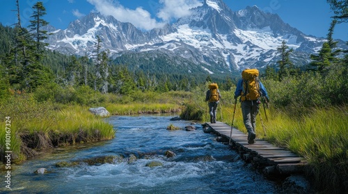 Wallpaper Mural Hikers crossing a wooden bridge near a mountain landscape. Torontodigital.ca