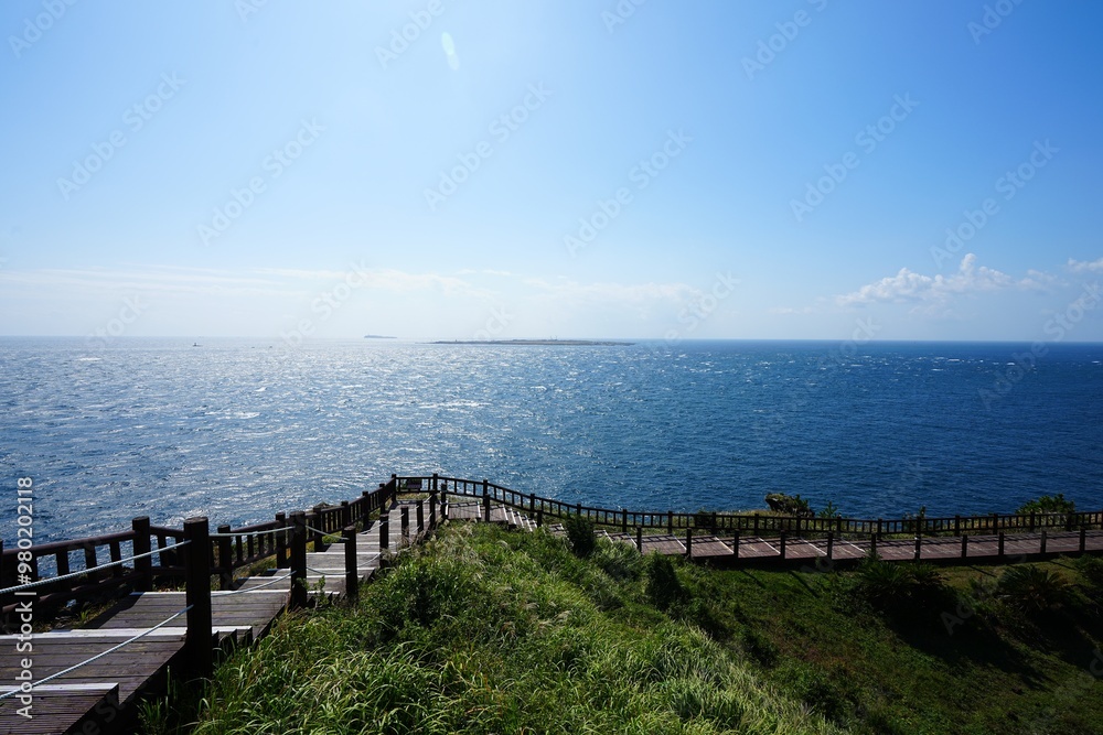 fine seaside walkway and far island fine seaside walkway and far island