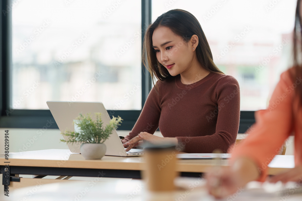 Successful business woman working at office Successful business woman working at office