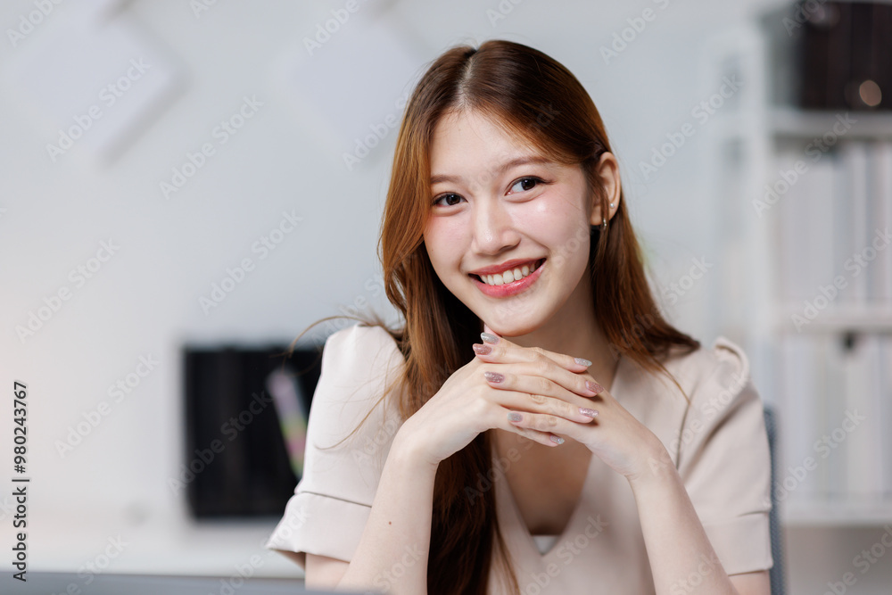 Young happy woman work on laptop, asian female reading financial document report or learning online education and business concept.
Young happy woman work on laptop, asian female reading financial document report or learning online education and business concept.