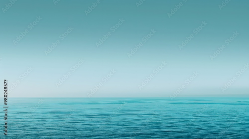 Calm Ocean Horizon: A minimalist view of a tranquil ocean with a smooth gradient from deep blue to light turquoise. Calm Ocean Horizon: A minimalist view of a tranquil ocean with a smooth gradient from deep blue to light turquoise.