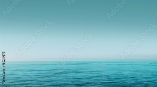 Wallpaper Mural Calm Ocean Horizon: A minimalist view of a tranquil ocean with a smooth gradient from deep blue to light turquoise. Torontodigital.ca