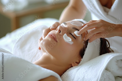 Young woman lying down for beauty treatment