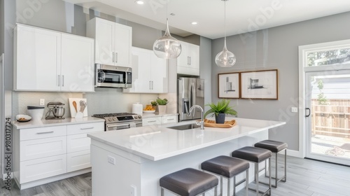 Modern Kitchen with White Cabinets, Waterfall Island, and Poster Mockup for Kitchenware Display