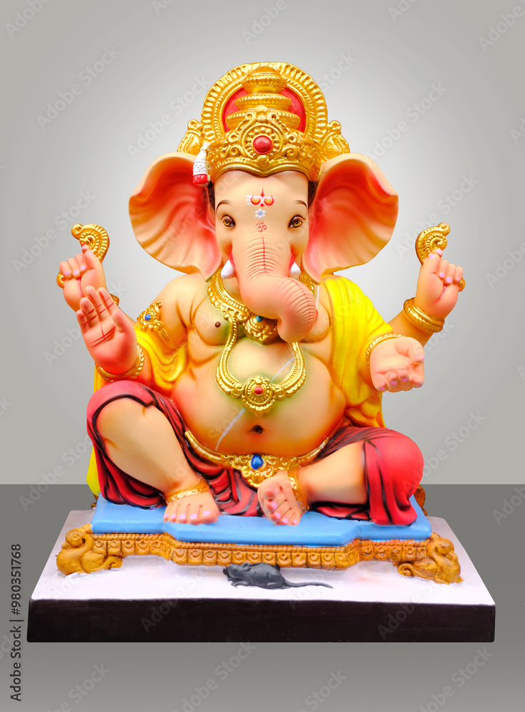 Hindu God Ganesha on gray color background, Ganesha Idol. Ganesh festival. Hindu God Ganesha on gray color background, Ganesha Idol. Ganesh festival.
