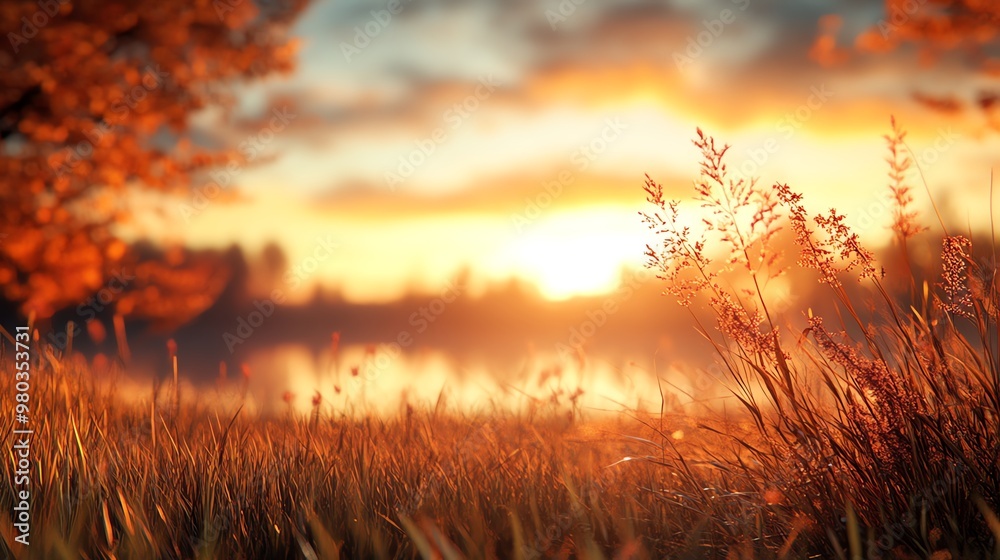 A serene autumn sunset view reflecting on calm waters, framed by golden foliage and soft grasses, embracing nature's beauty. A serene autumn sunset view reflecting on calm waters, framed by golden foliage and soft grasses, embracing nature's beauty.