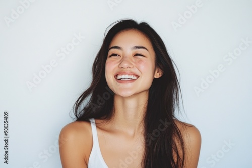 Portrait of a Smiling Woman with Long Black Hair