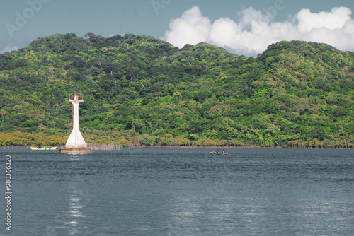 Wallpaper Mural As the mountains stand tall in the port, the fishermen's boat sets sail. Torontodigital.ca