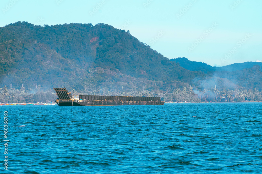 As the mountains stand tall in the port, the fishermen's boat sets sail. As the mountains stand tall in the port, the fishermen's boat sets sail.