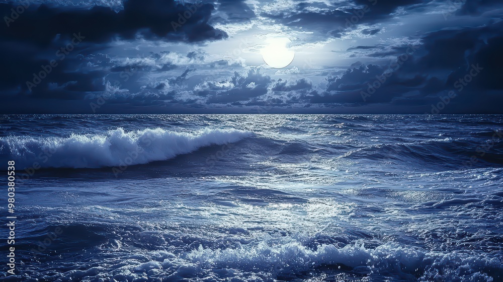 Fototapeta premium Dark Ocean Waves Wallpaper. Gentle waves of a dark ocean under a cloudy night sky.