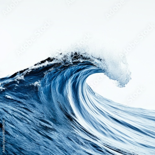 A stunning ocean wave captured in motion, showcasing the beauty and power of nature with vibrant blue tones and dynamic movement.