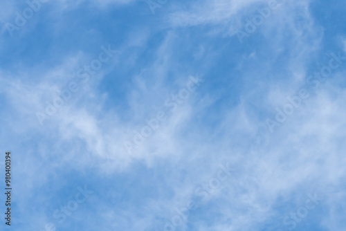 Fototapeta Naklejka Na Ścianę i Meble -  The afternoon sky with white soft high cirrus clouds