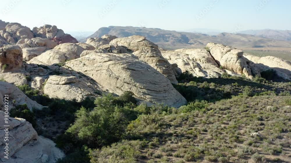 Backward view of White rock made of layered petrified sandstone in the Arizona desert, USA Backward view of White rock made of layered petrified sandstone in the Arizona desert, USA