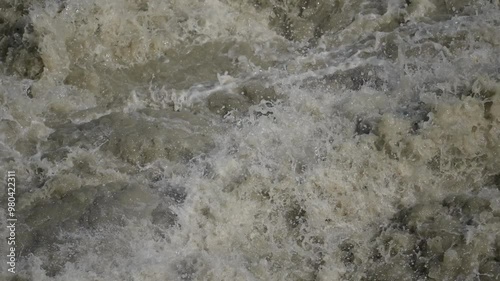 Water at the hydro power plant abwinden-asten in Austria at a floog in september 2024, open flood gates at the danube river photo