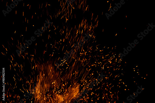 fire flame with sparks on black background.