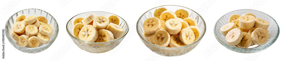 A set of glass bowls containing sliced bananas, arranged in a line, perfect for healthy breakfast or snack ideas. A set of glass bowls containing sliced bananas, arranged in a line, perfect for healthy breakfast or snack ideas.