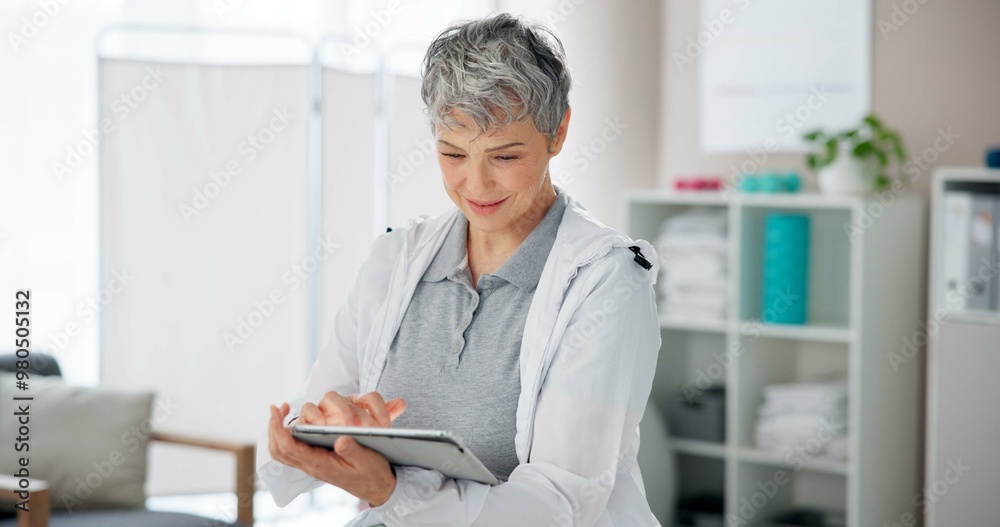 Physiotherapy, research and mature woman with tablet in office for client, booking and patient database. Medical, worker and physiotherapist with tech for appointment, schedule and telehealth records Physiotherapy, research and mature woman with tablet in office for client, booking and patient database. Medical, worker and physiotherapist with tech for appointment, schedule and telehealth records