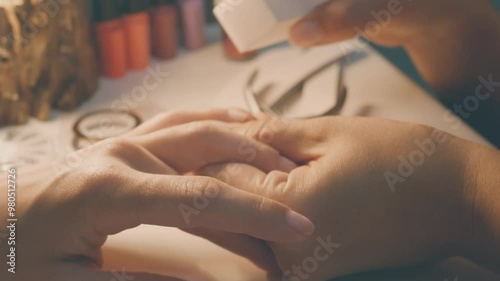 Wallpaper Mural The master does a manicure to his client. A professional manicurist cleans the nails of a young girl with a file. Torontodigital.ca