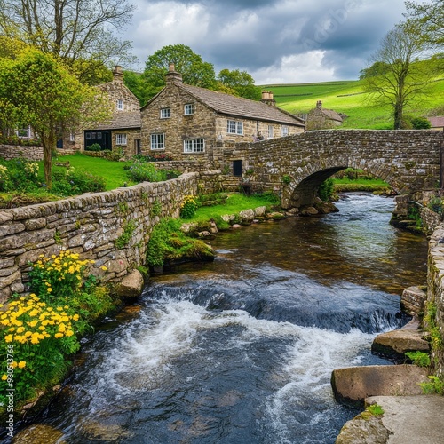 Charming stone cottage nestled by a babbling brook, a picturesque English countryside scene. photo