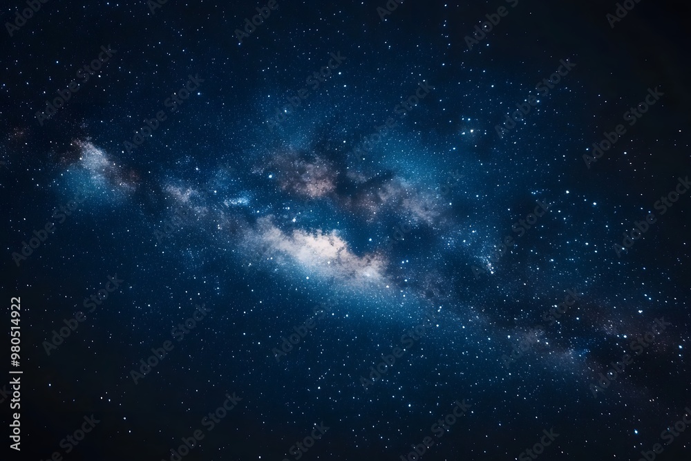 Fototapeta premium A dark night sky with stars and the Milky Way galaxy in view. 