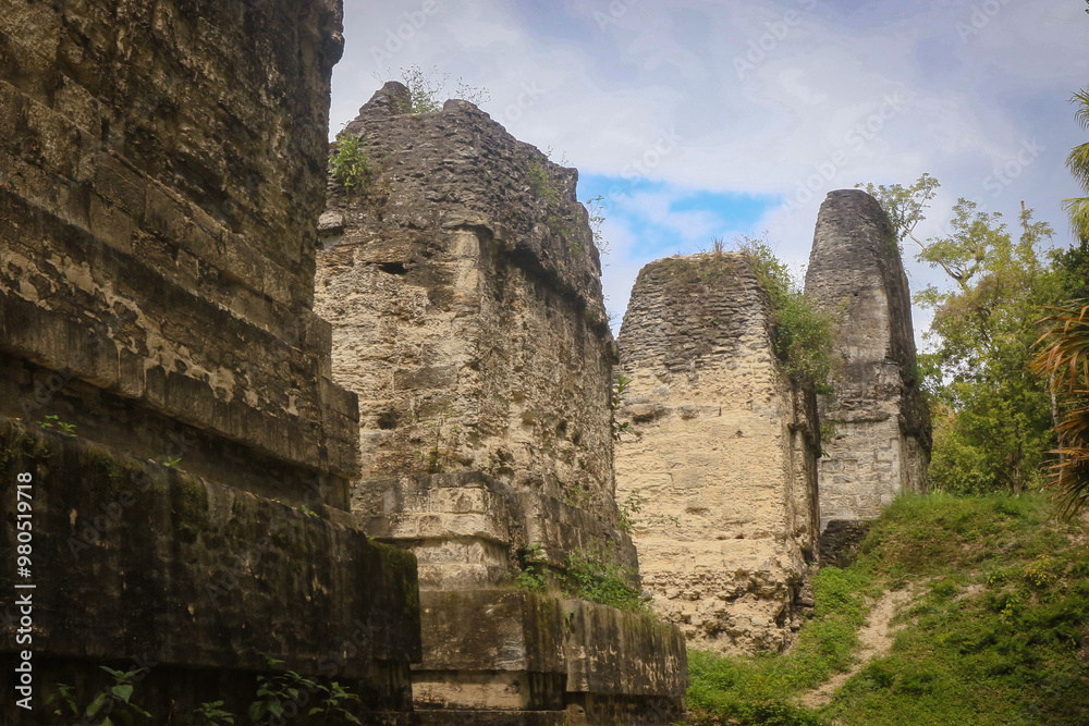 Explore the ancient ruins of Tikal in Guatemala, a stunning archaeological site reflecting Mayan history and culture amidst lush greenery Explore the ancient ruins of Tikal in Guatemala, a stunning archaeological site reflecting Mayan history and culture amidst lush greenery