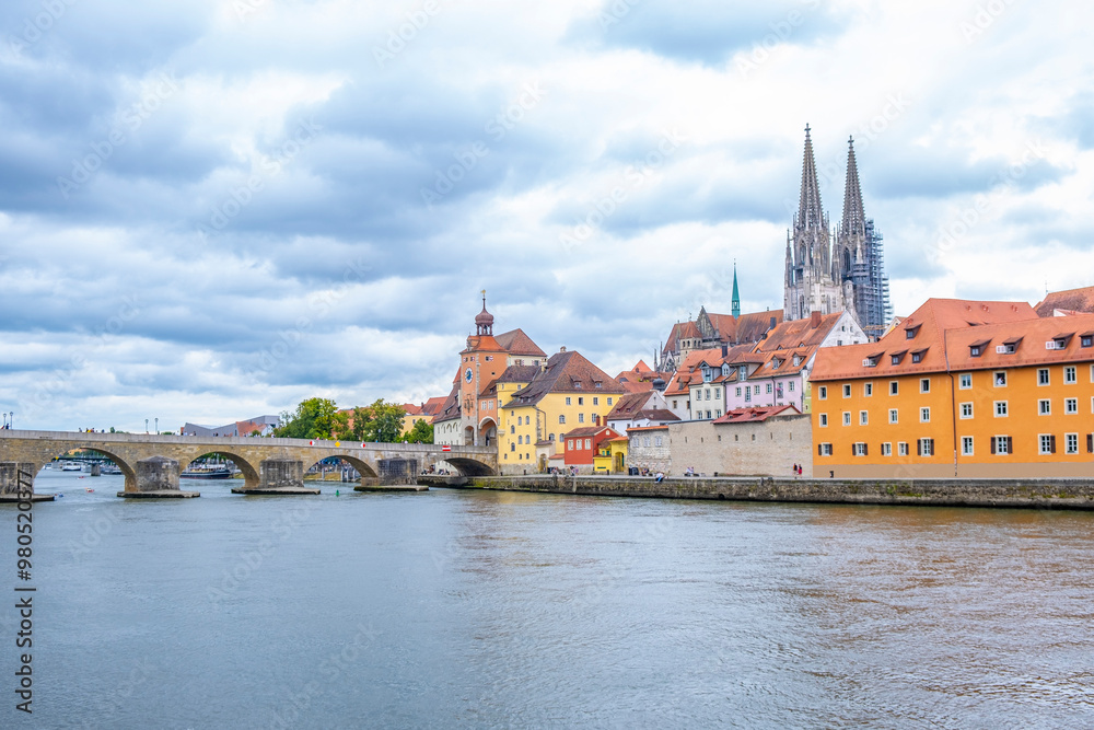 Regensburg, Germany - The picturesque skyline including the stone bridge over the Danube River, Saint Peter's Church