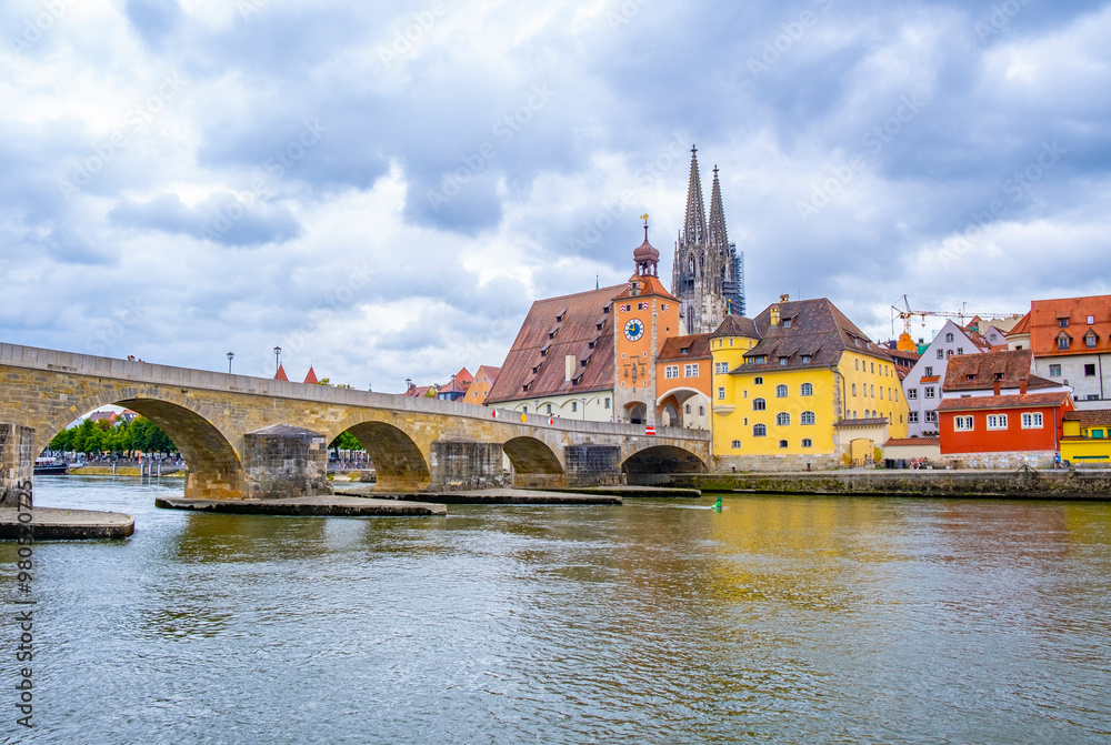 Regensburg, Germany - The picturesque skyline including the stone bridge over the Danube River, Saint Peter's Church