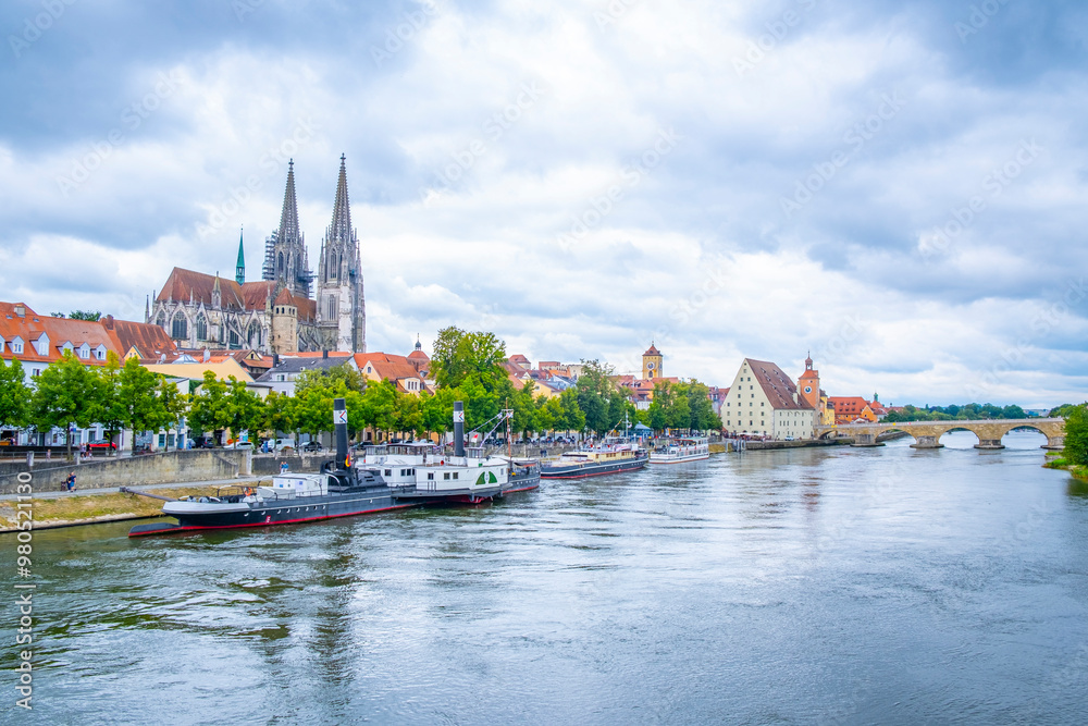 Regensburg, Germany - The picturesque skyline including the stone bridge over the Danube River, Saint Peter's Church