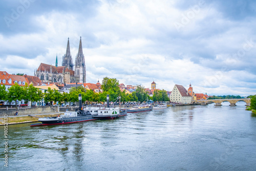 Obraz na płótnie Regensburg, Germany - The picturesque skyline including the stone bridge over the Danube River, Saint Peter's Church w salonie