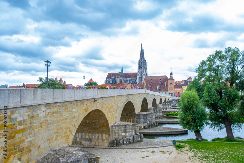 Regensburg, Germany - The picturesque skyline including the stone bridge over the Danube River, Saint Peter's Church