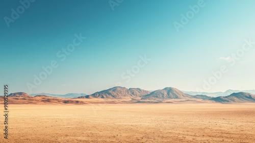 Expansive desert landscape with a clear sky background evoking solitude adventure and the vastness of the natural world