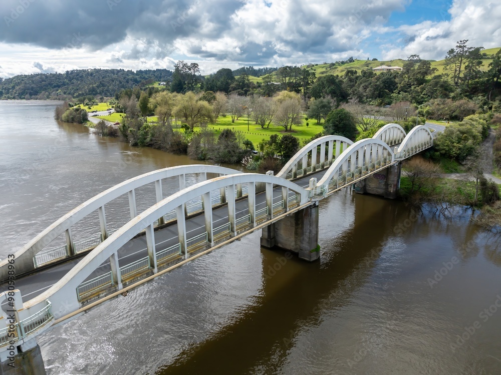Tuakau Bridge crossing the Waikato River, Tuakau, Waikato, New Zealand. Tuakau Bridge crossing the Waikato River, Tuakau, Waikato, New Zealand.