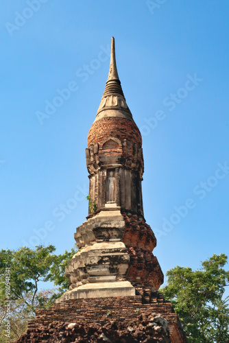 The Chedi of the Wat Tra Phang Ngoen, Wat Traphang Ngoen Temple, decorated with a white buddha statue, sculpture, relief, Historical Park, archaeological site, ancient ruins of Sukhothai, Thailand photo