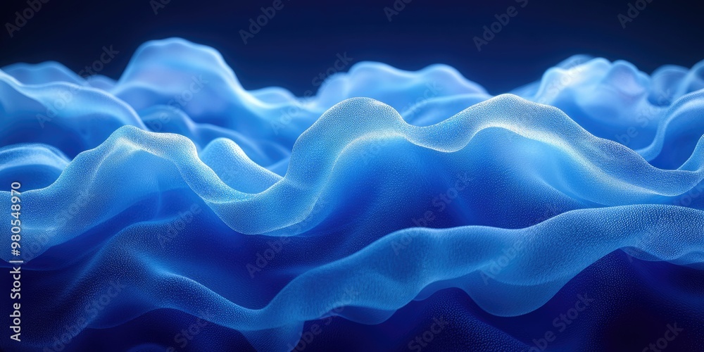 Obraz premium Abstract blue waves creating a fluid, dynamic visual effect.