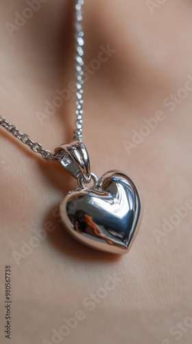 Elegant silver heart pendant on delicate chain for jewelry lovers and gift ideas photo