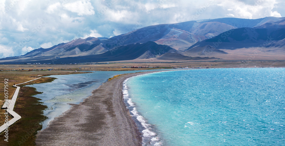 Fototapeta premium Aerial photography of the famous Sayram Lake and grassland pastures in Xinjiang, China